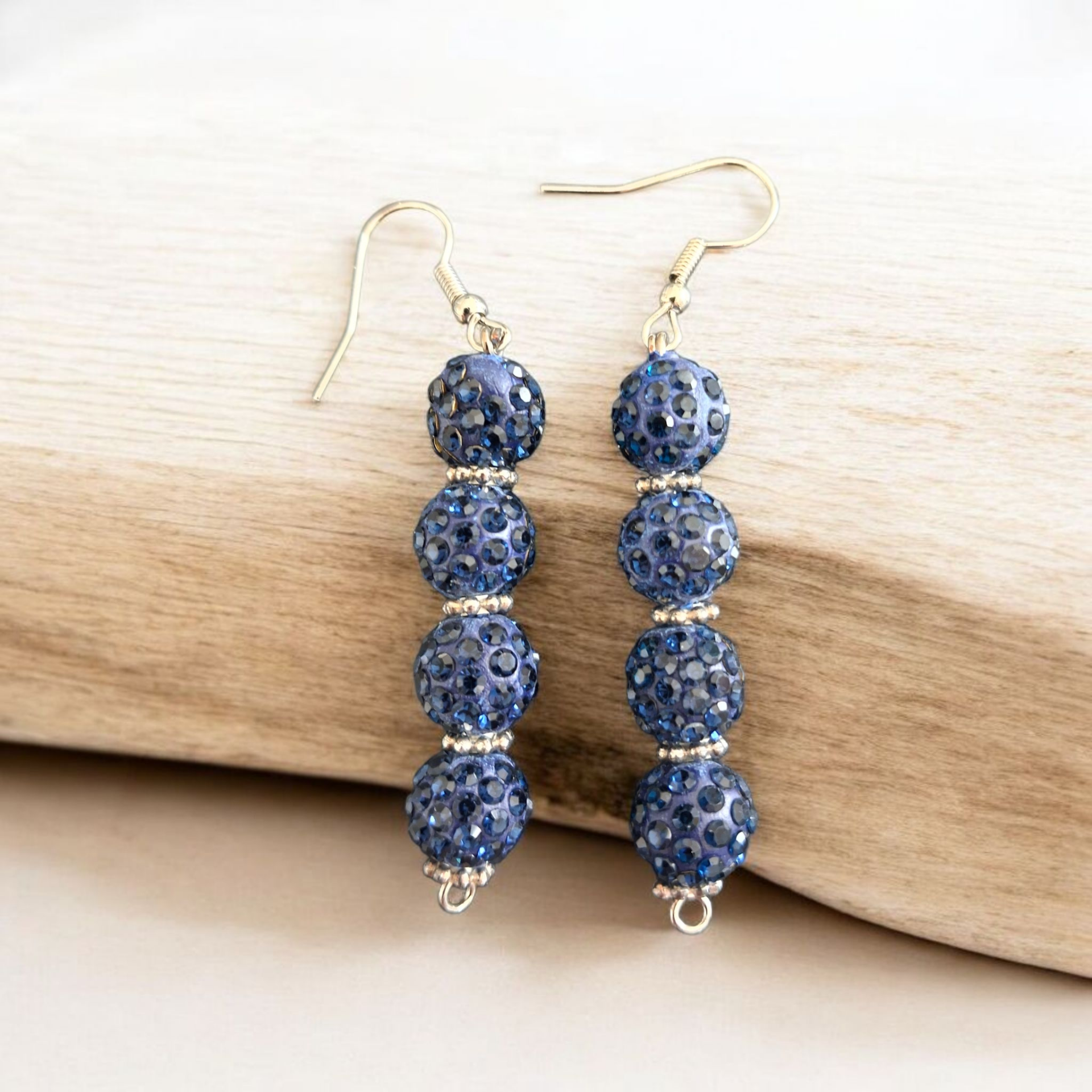 Boucles d'oreilles - Perles bleu marine avec incrustation de pierre iridescente