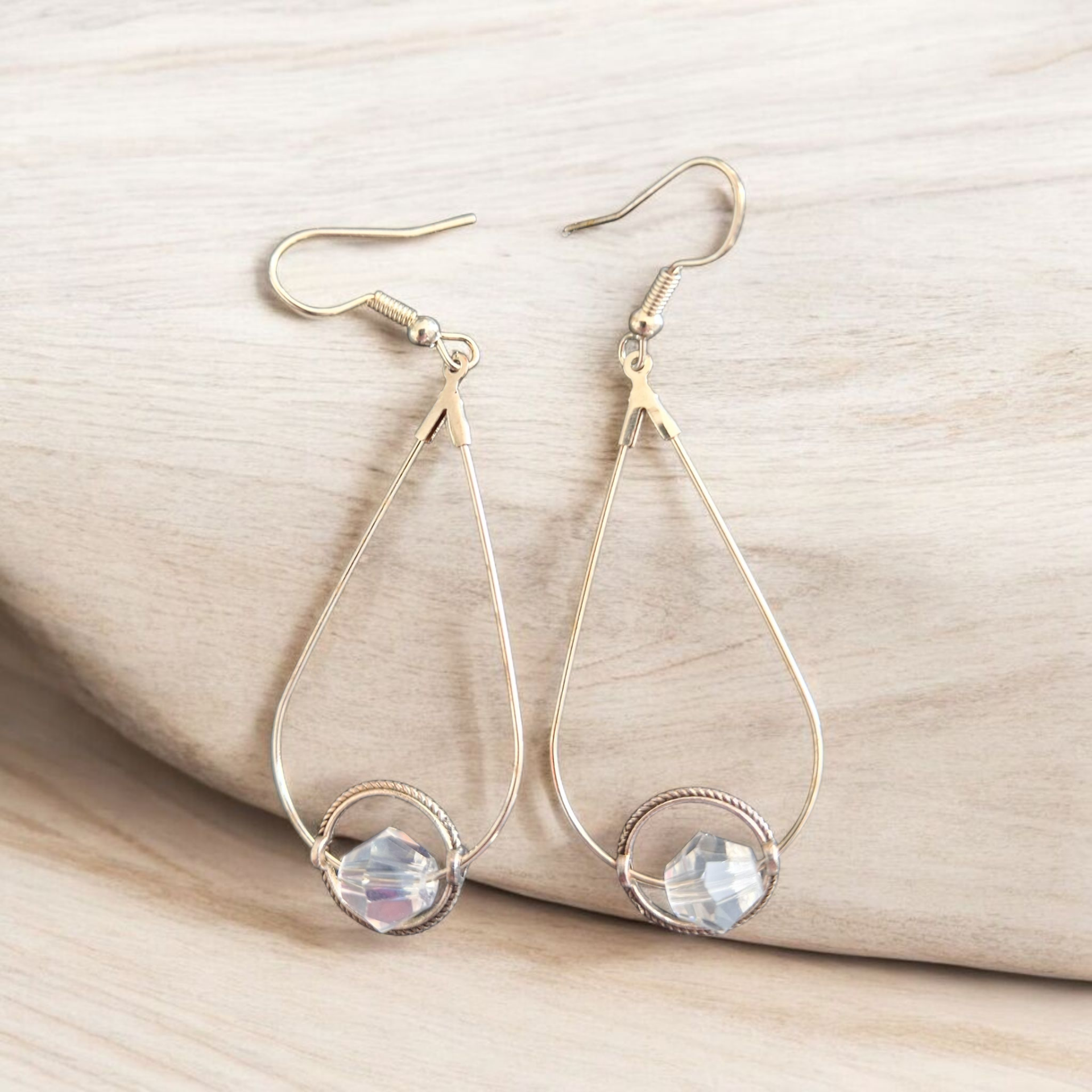 Boucles d'oreilles - Sphère  transparente façonnée