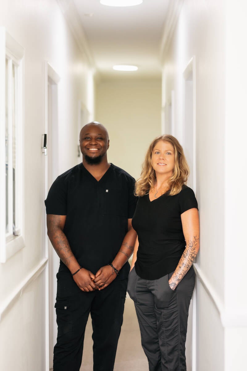 “Massage therapists Lee and Jo, owners of Rest and Reset Massage and Temple Ritual Bodywork, providing personalized massage therapy and holistic wellness services.”