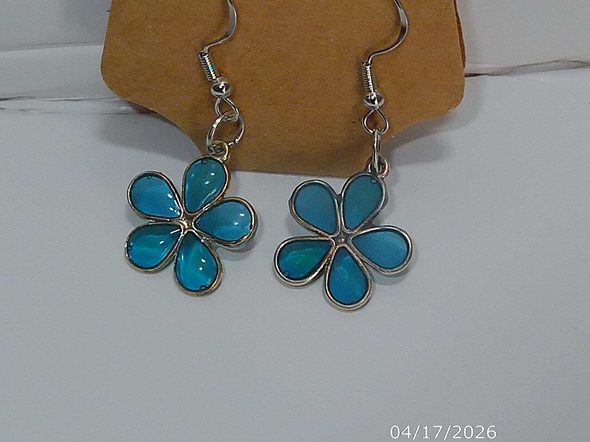Turqoise blue UV Resin Flower Drop Earrings.