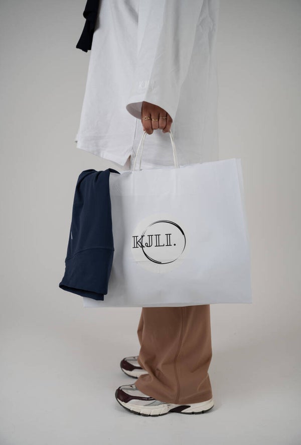 High waist KJLI. Flared pants Beige