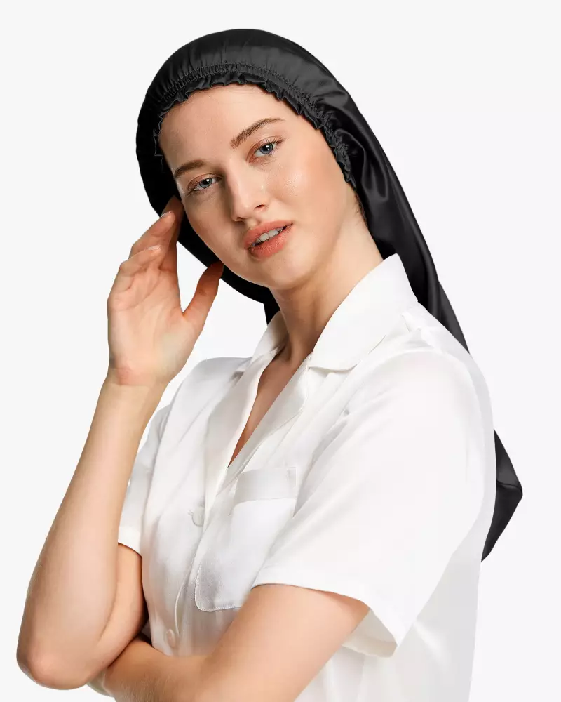 Elegante Seide Nachthaube Dies ist eine lange Seidenschlafhaube. Sie können Ihr langes Haar sehr entspannt in den Schlummertrunk legen, anstatt wie der kurze Schlummertrunk auf dem Kopf gefaltet zu werden, kann es leicht vor dem Schlafengehen auf dem Kopf