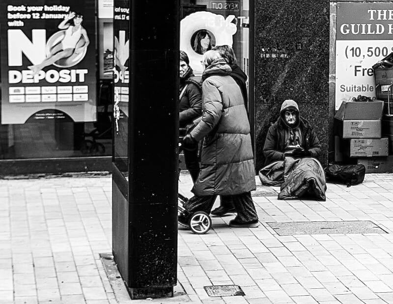 ignored-by-society-passers-by-birkenhead-shopping-center-birkenhead-2025-standard-ofitv8.jpg