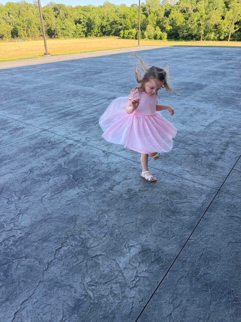 Emery showing off her princess dress &amp; shoes