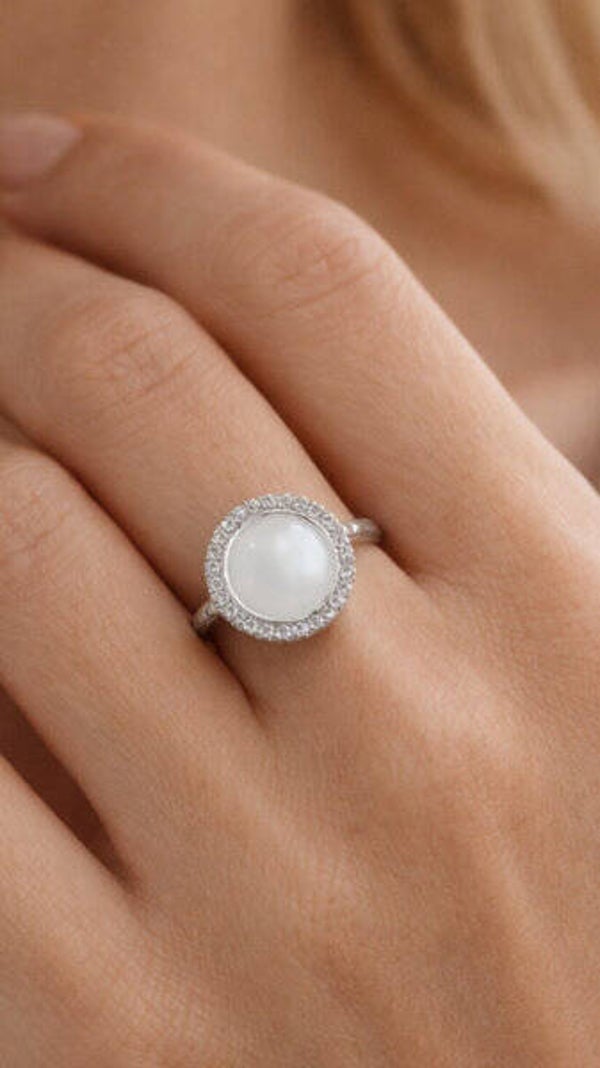 Luxe ronde moedermelk- en asring: een prachtig gedenksieraad omlegd met zirconia steentjes