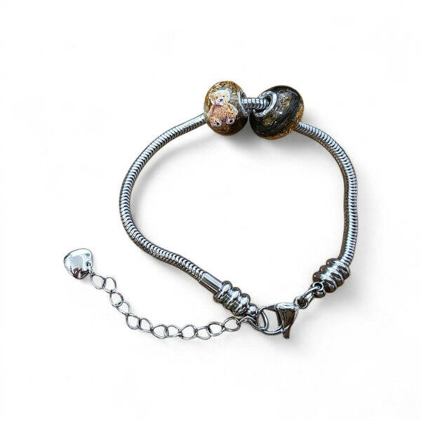 Naar wens gevulde Bedel met rvs armband (met haar, as of moedermelk)