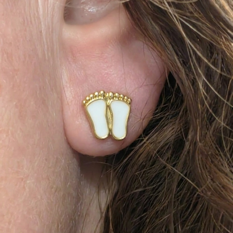 Edelstalen babyvoetjes moedermelk oorbellen in goud of zilverkleur