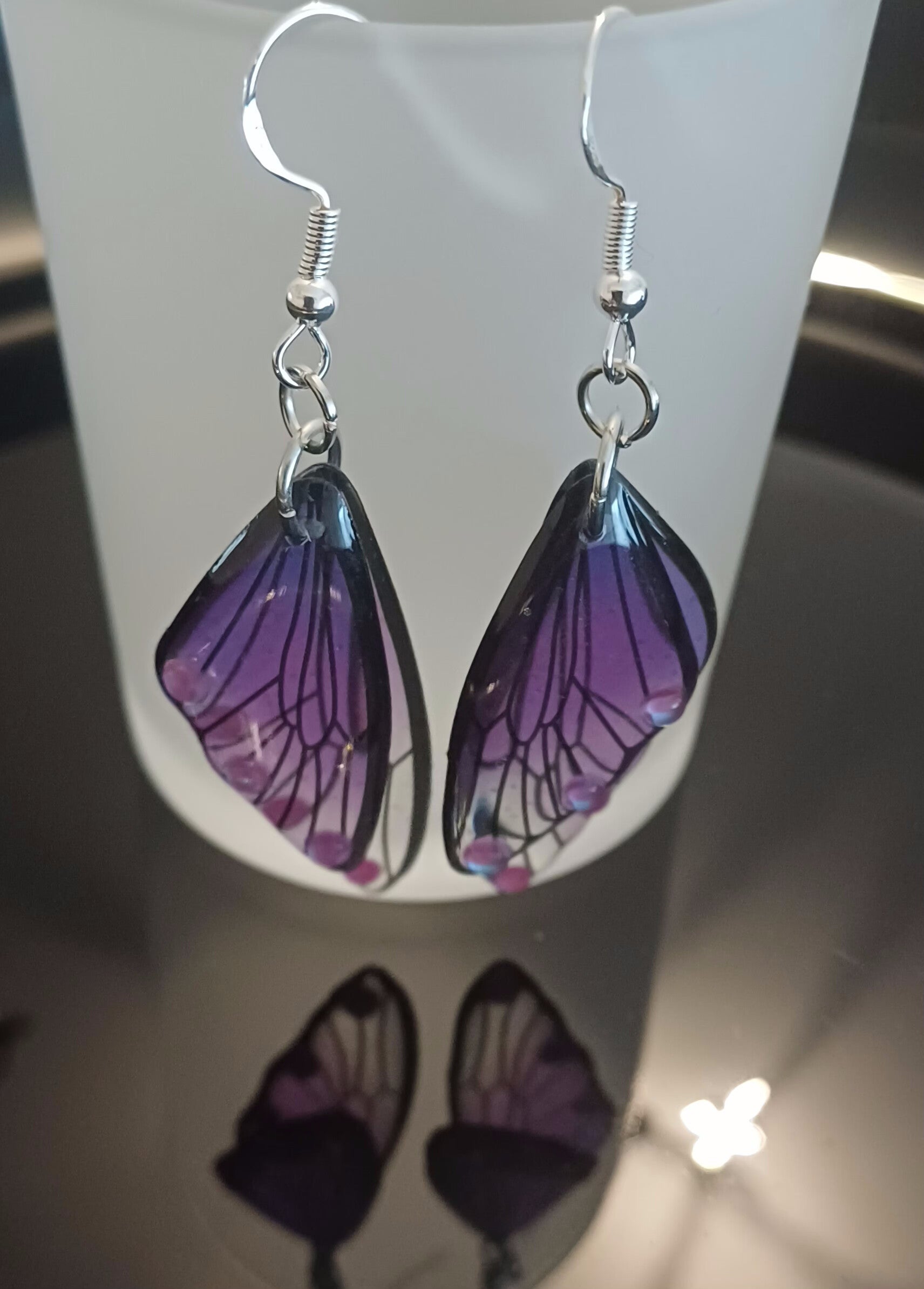 Damen Ohrschmuck Flügel lila