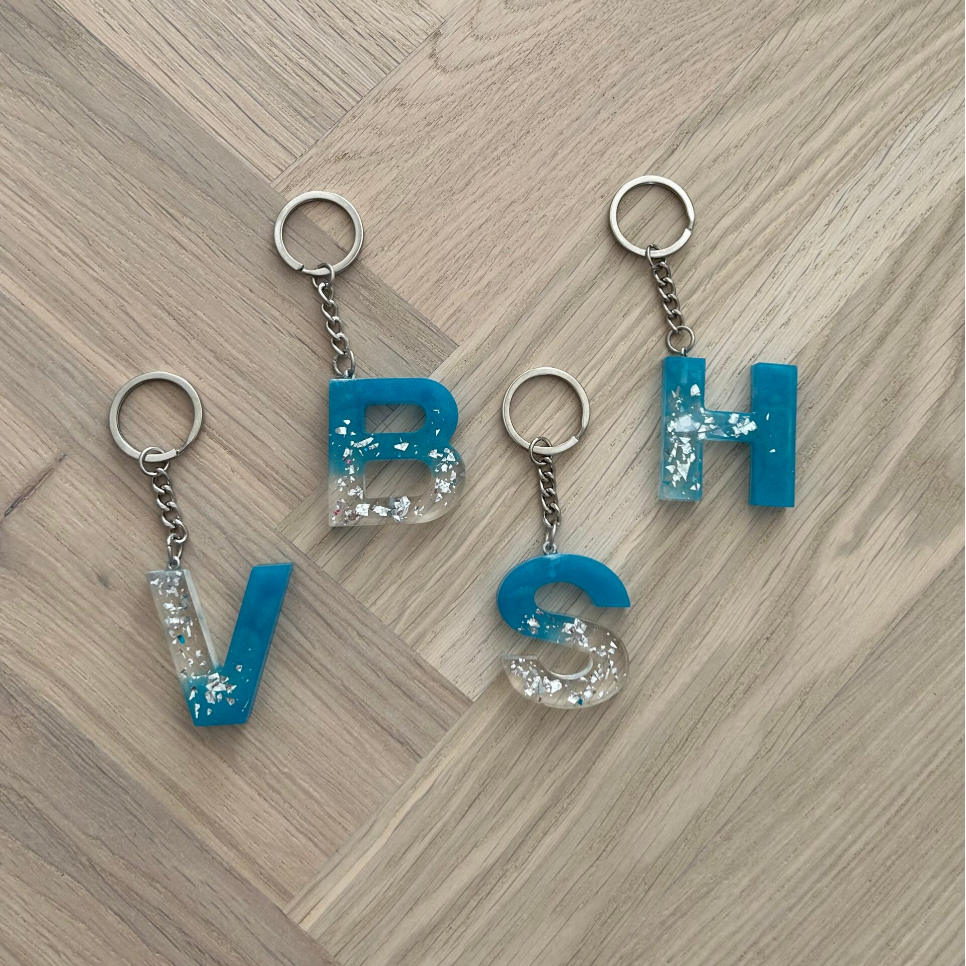 Sleutelhanger oceanblue/bladsliver