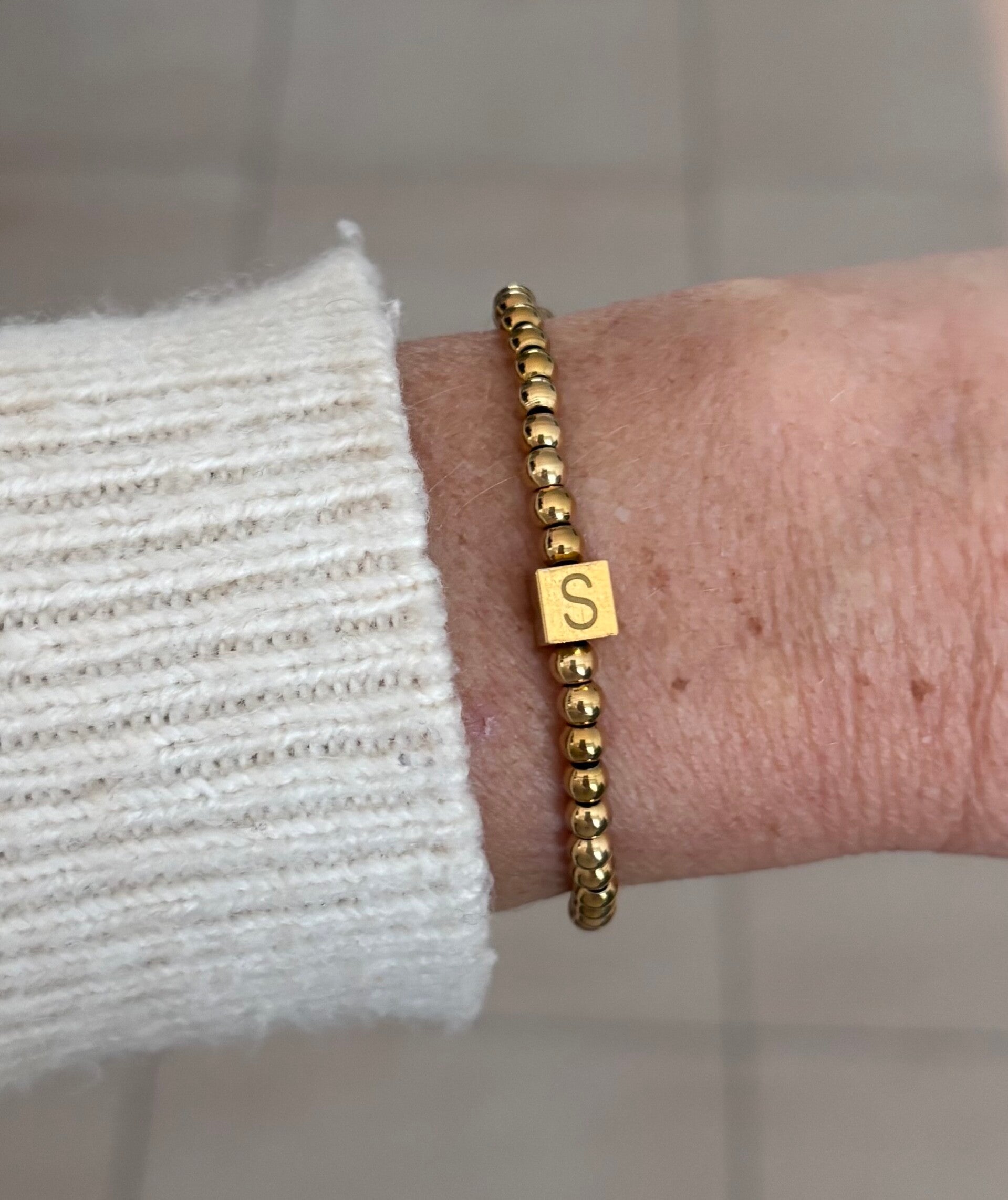 Armband letter kubus