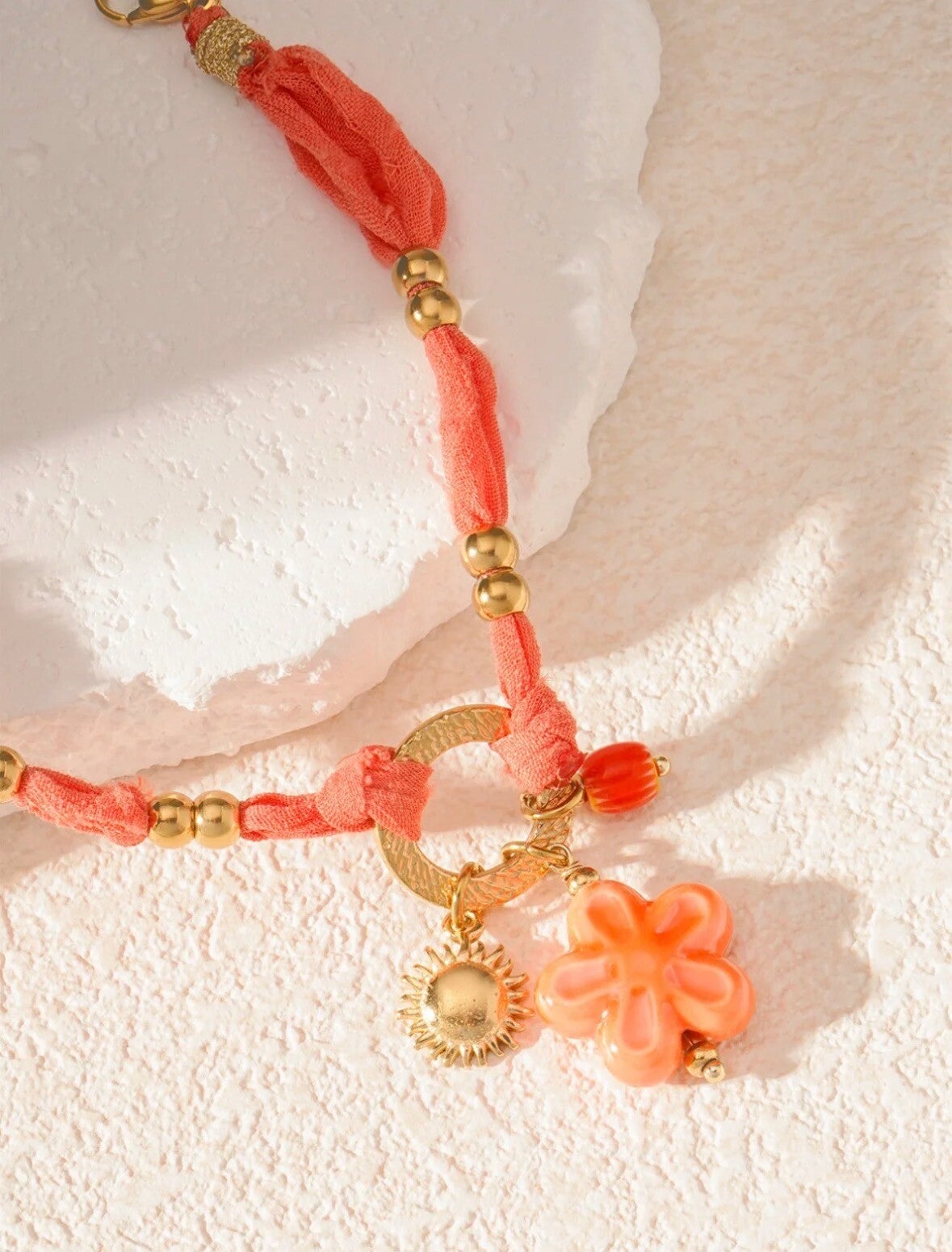 SUNNY FLORAL KETTING ORANJE