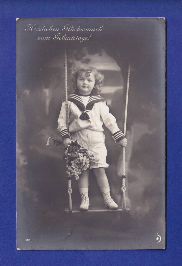 ENFANT - Sur la balançoire