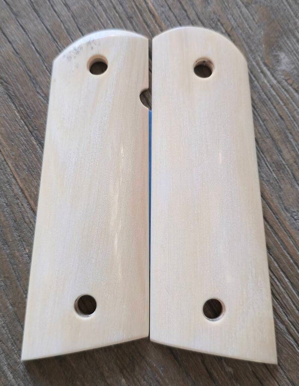1911 Govt size White mammoth ivory # 561