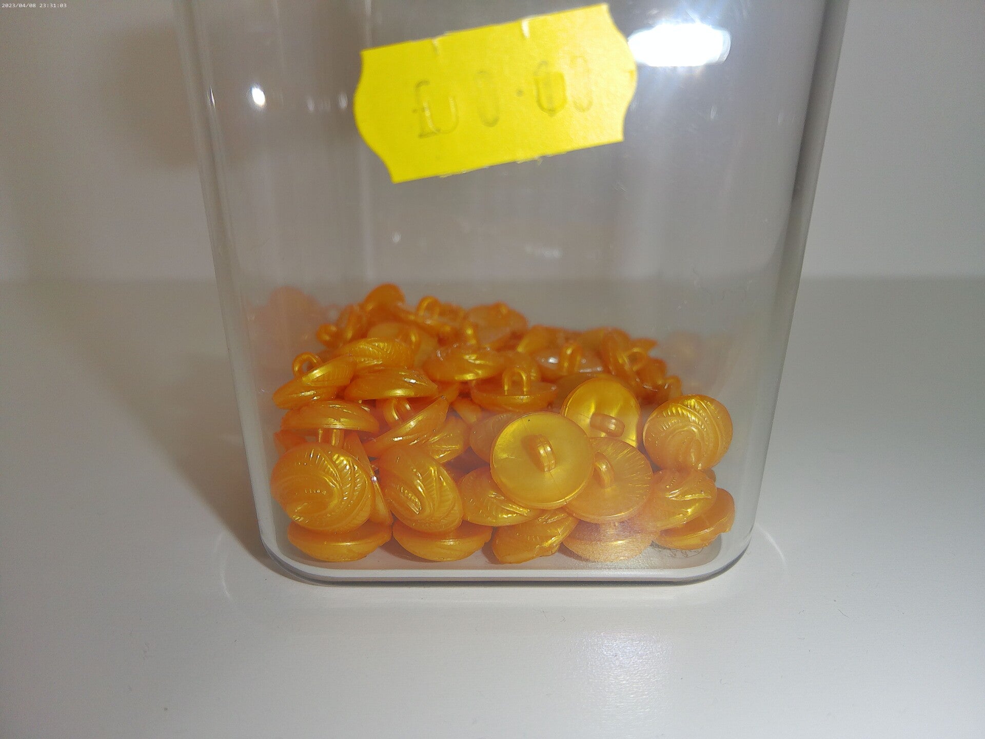 Extra small ornage button