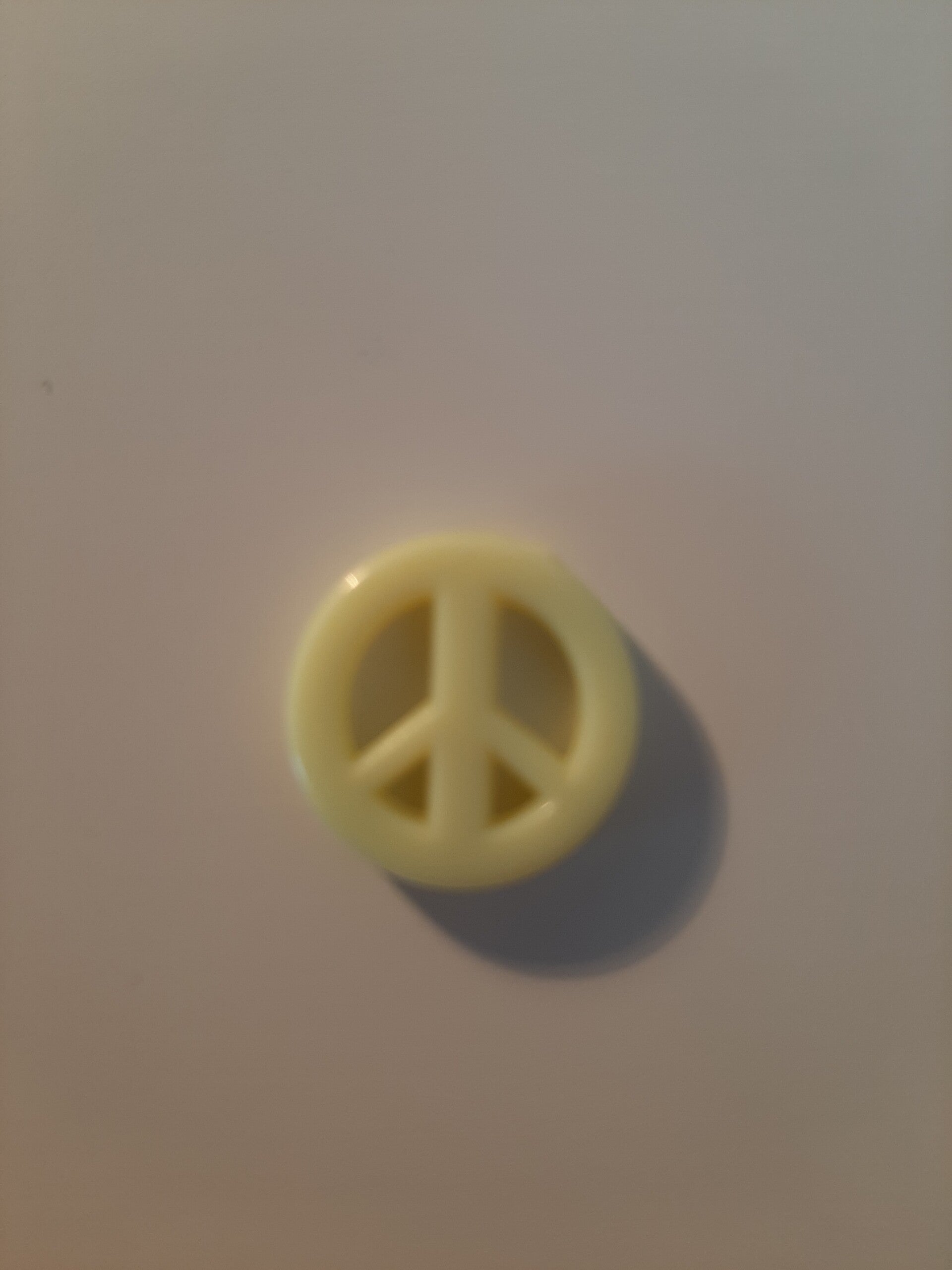 Peaceteken geel