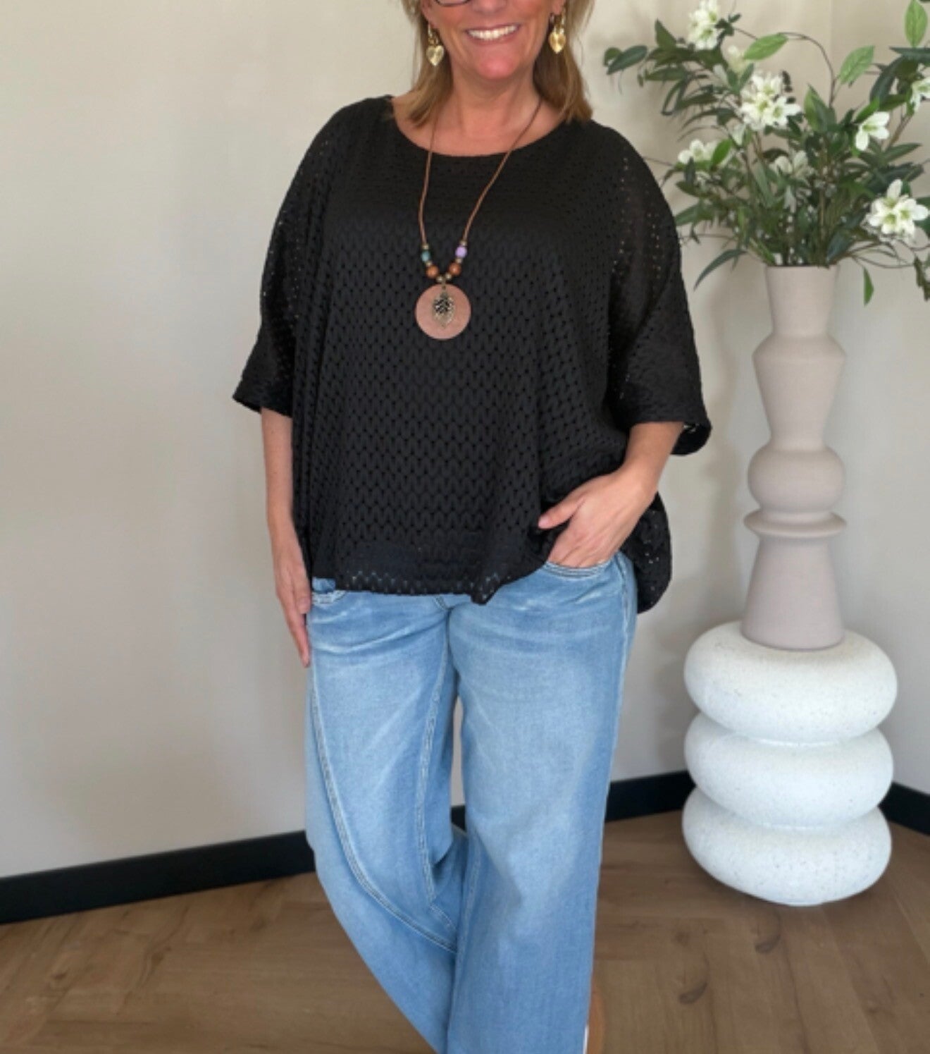 Opengewerkte top incl ketting