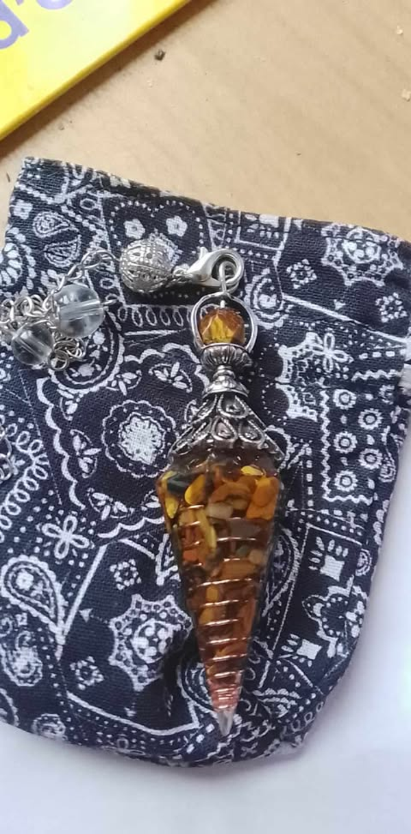 pochon + pendule orgonite oeil de tigre