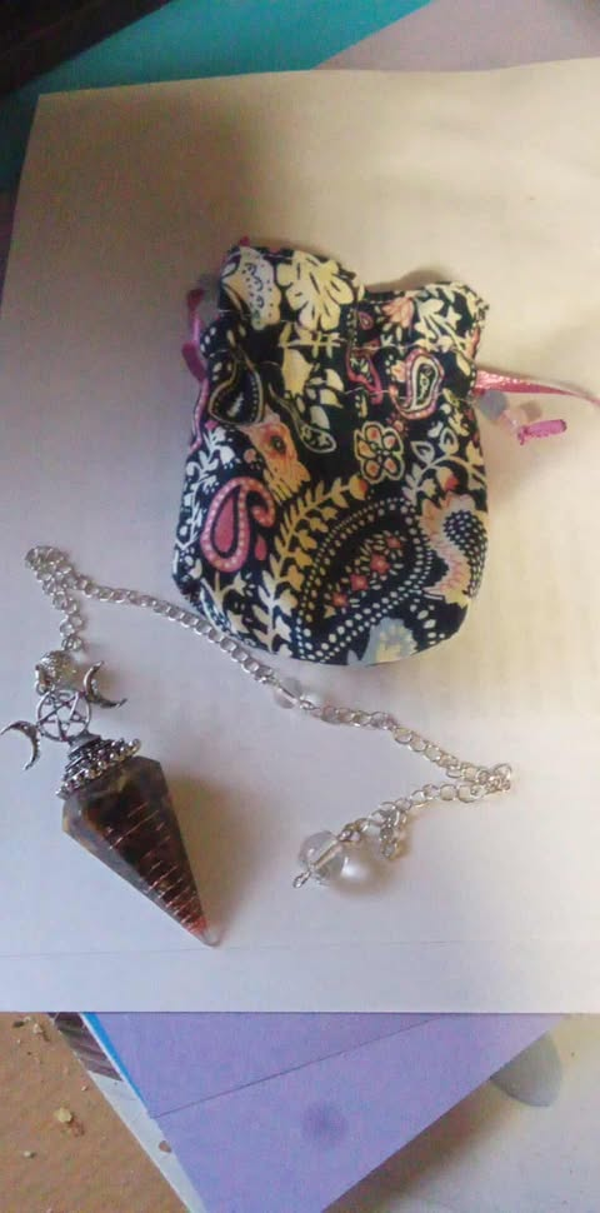 pochon + pendule orgonite oeil de tigre