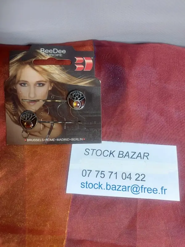 Deux épingles à cheveux femme avec strass ou pierre orange