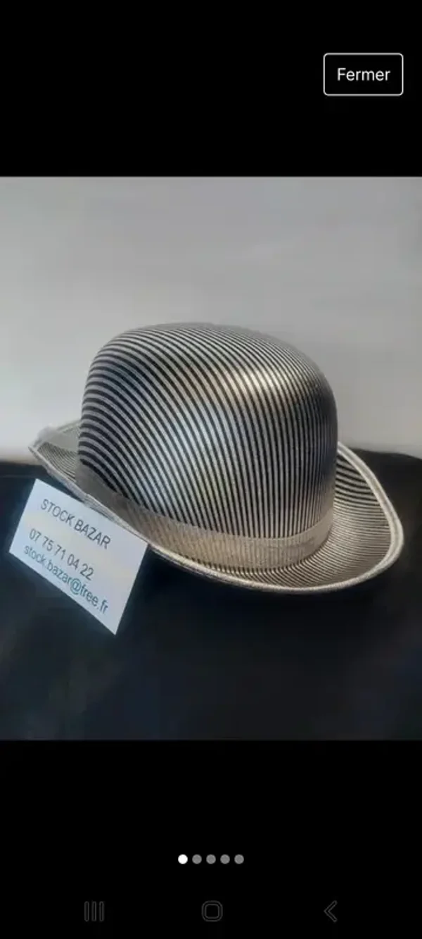 Chapeau melon argenté et noir