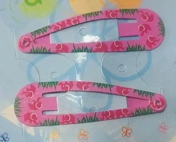 Barrettes pinces clic clac modèle éléphants rose avec paillettes
