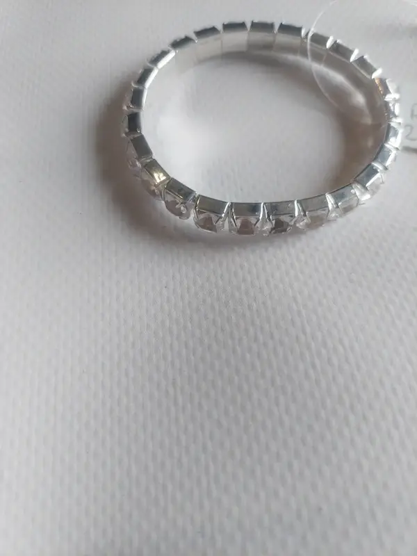 Bracelet élastique argenté avec strass brillants