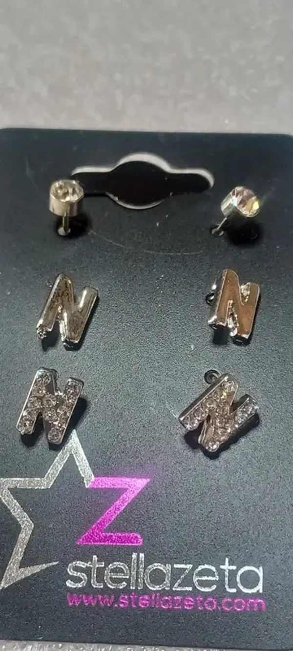 Boucles d'oreilles "N", diamant