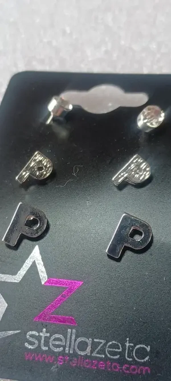 Boucles d'oreilles "P", diamant