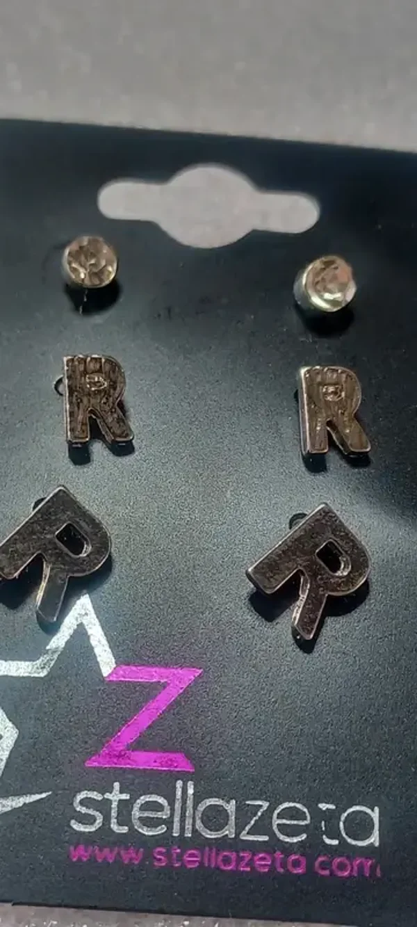 Boucles d'oreilles "R", diamant