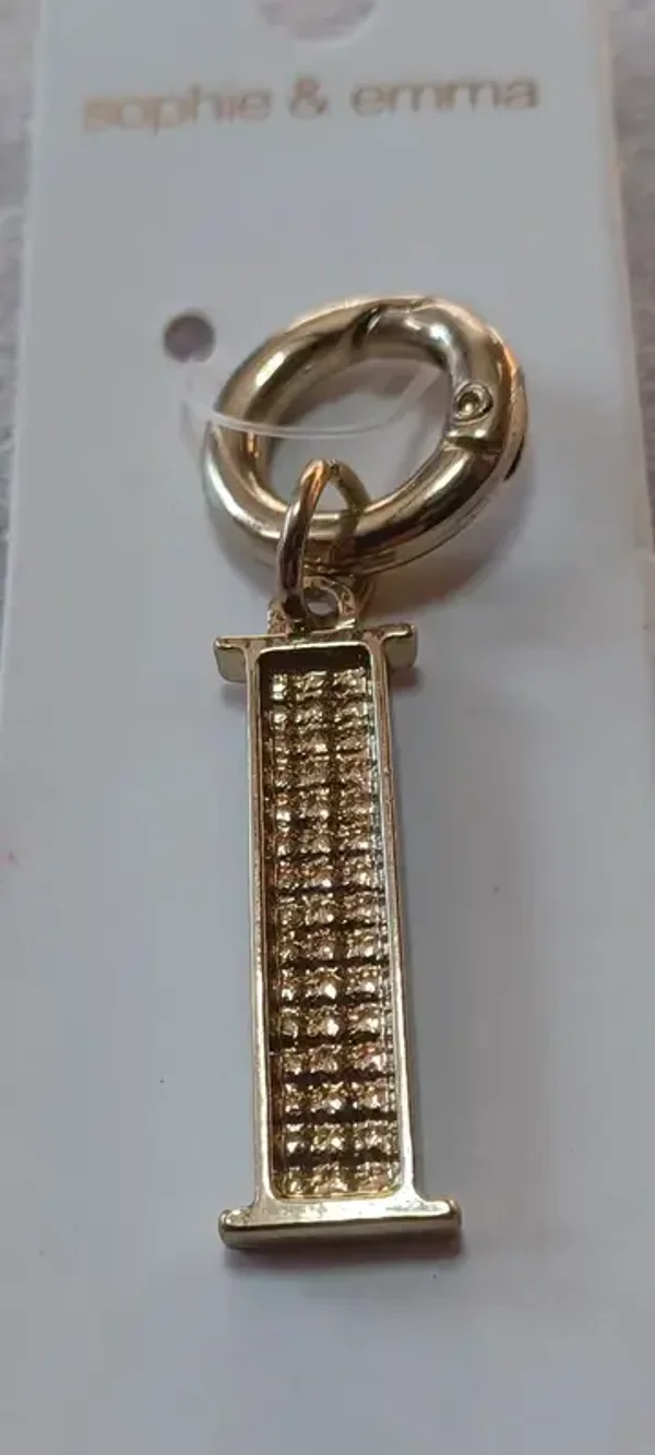 Porte-clés doré avec strass