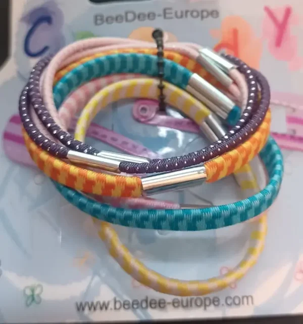 Lot d'élastiques et barrettes rayées