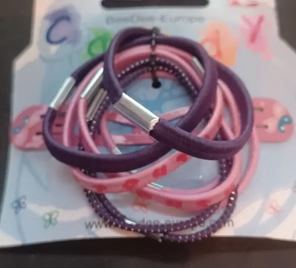 Lot d'élastiques et barrettes roses
