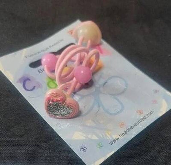 Double élastique avec petit coeur rose