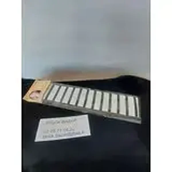 Bandeau blanc à rayures noires