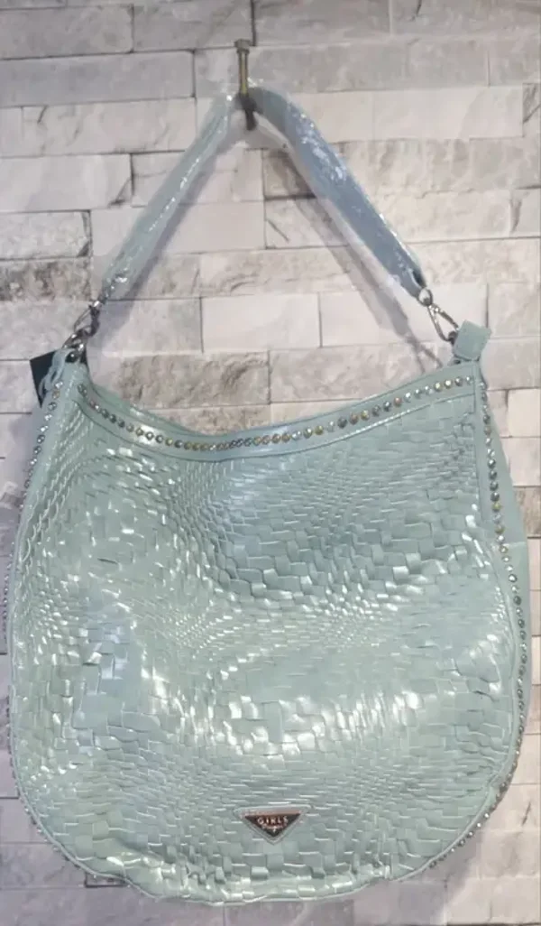 Sac turquoise effet tressé