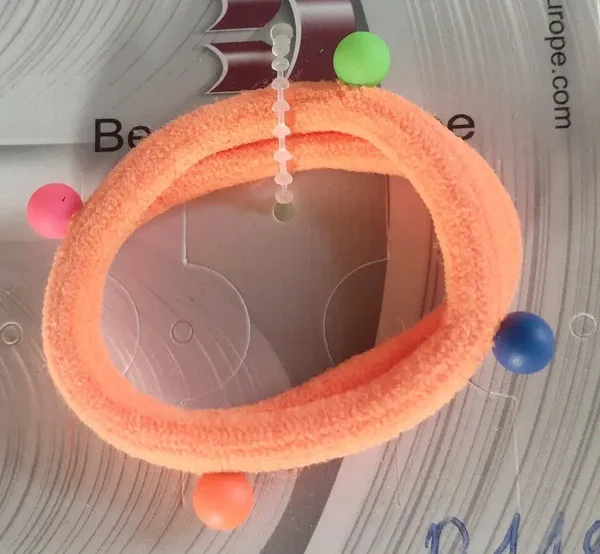 Élastique orange avec boules de couleurs