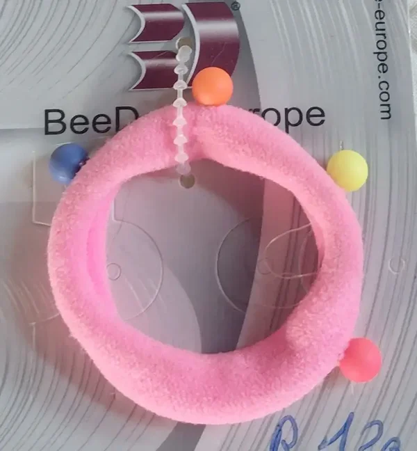 Élastique rose avec boules de couleur