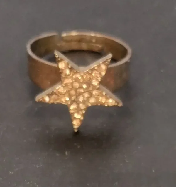 Bague étoile avec strass couleur bronze