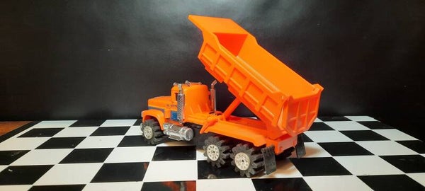 Orange Stomper Mack Dump Truck
