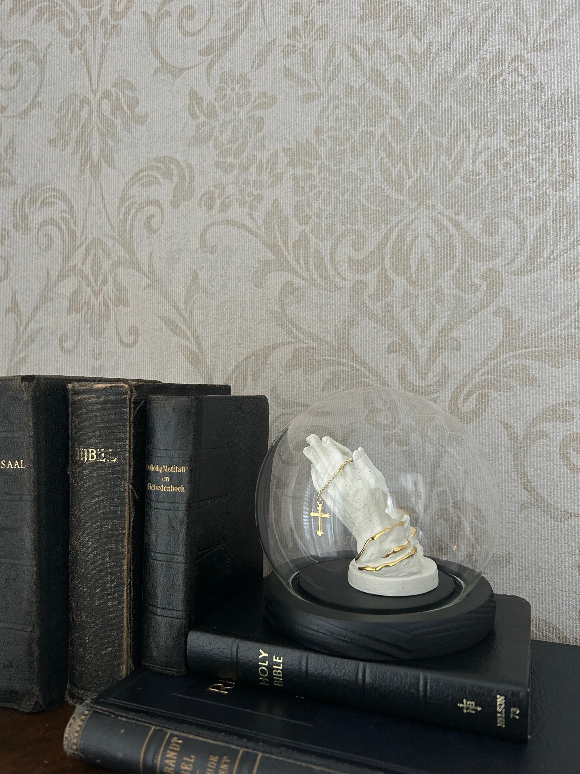 Praying hands in dome