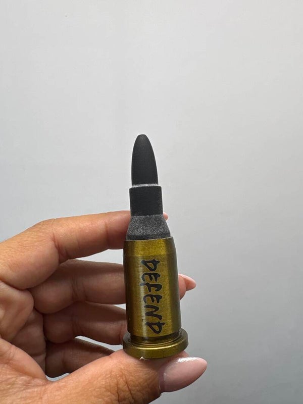 Obsidian Bullets carving