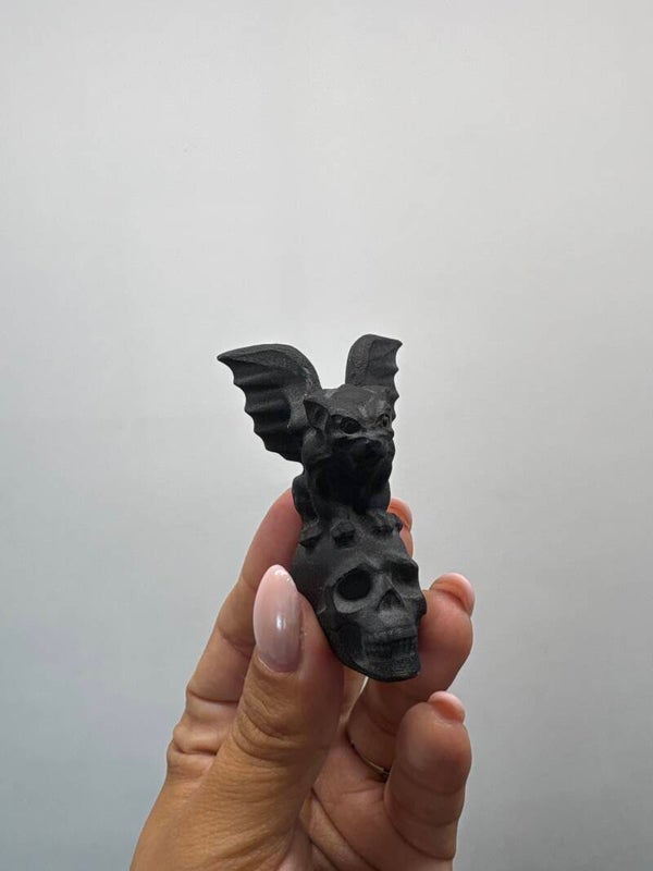 Obsidian Gargoyle on skull Carving