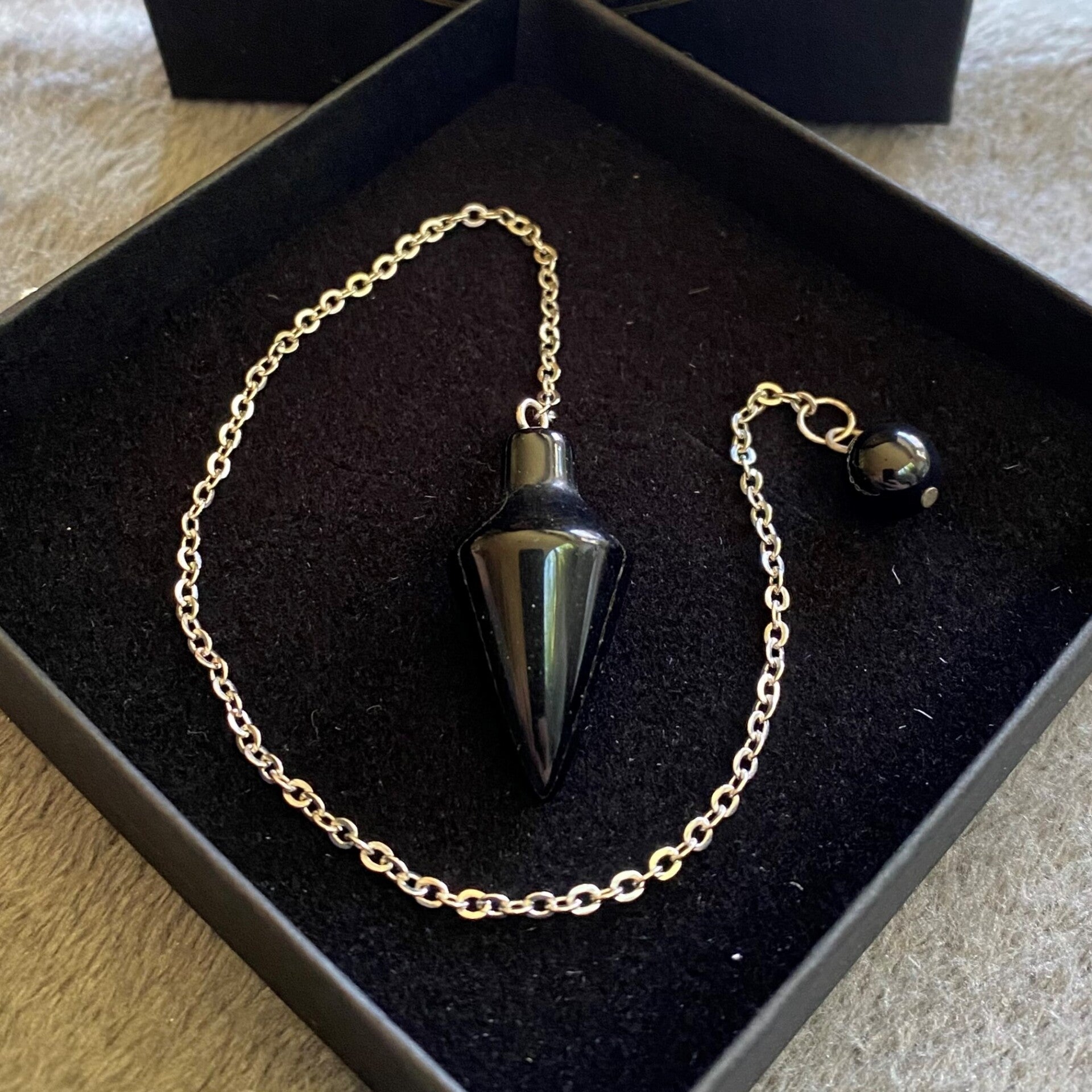 Pendel Onyx met eindkraaltje - Focus - 24cm