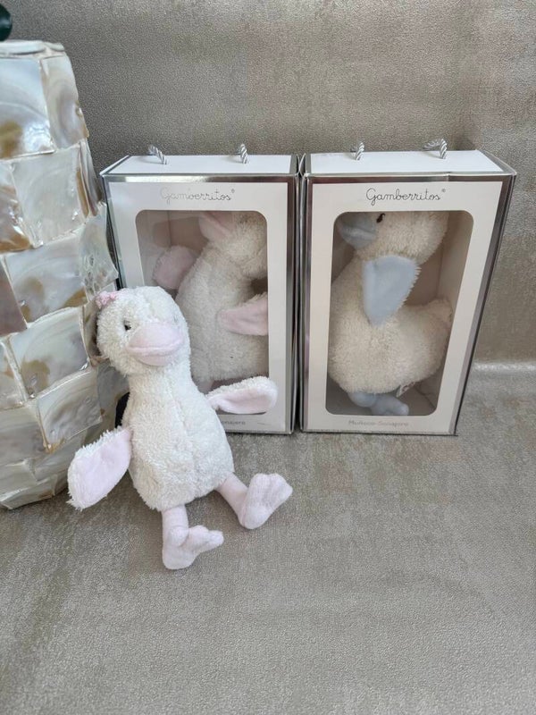 Knuffel eend met rammelaar