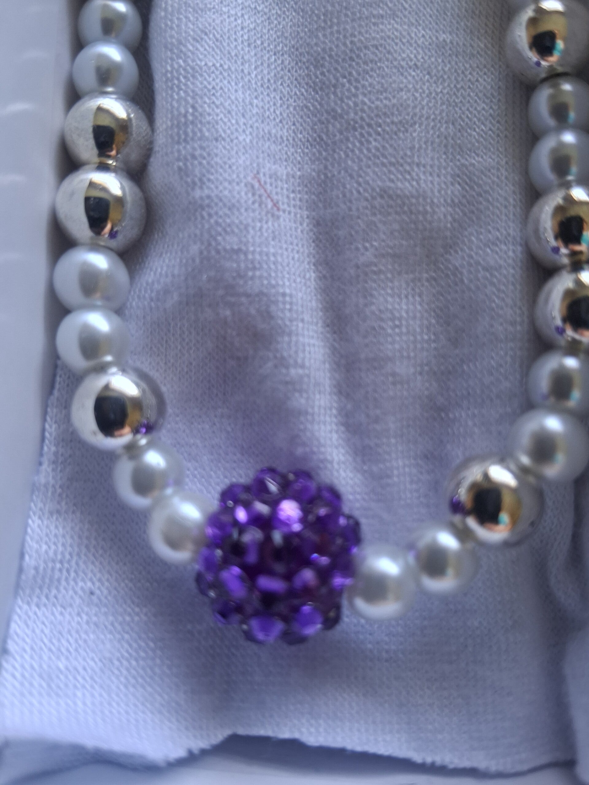 Purple f l a r e necklace