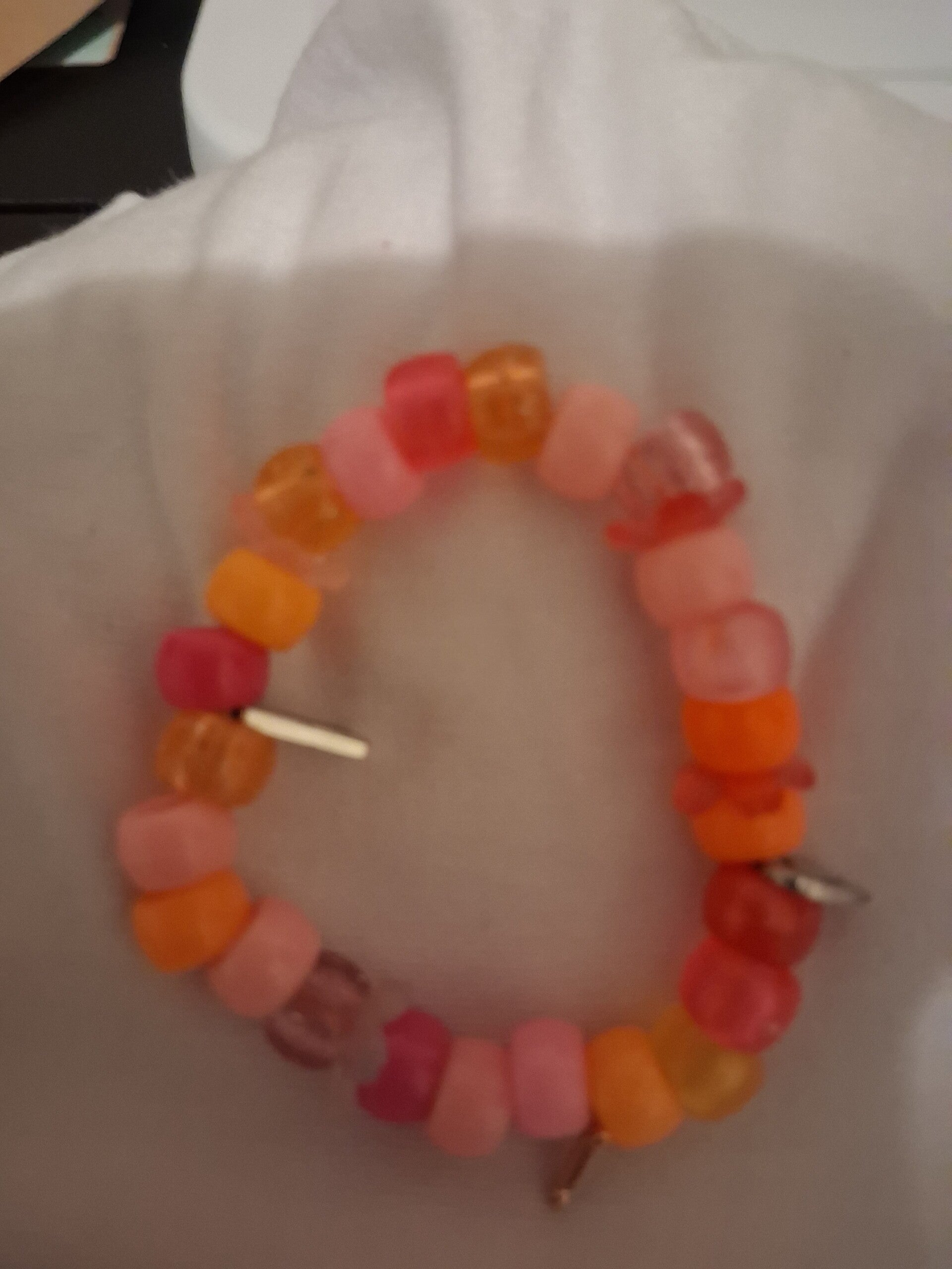 Pink and orange charm bracelet