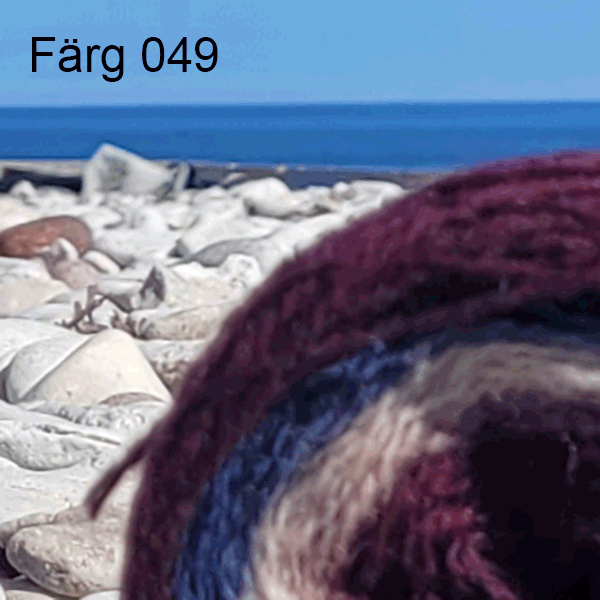 049 - Ullgarn 8/2, vinröda, blå och ljusa toner