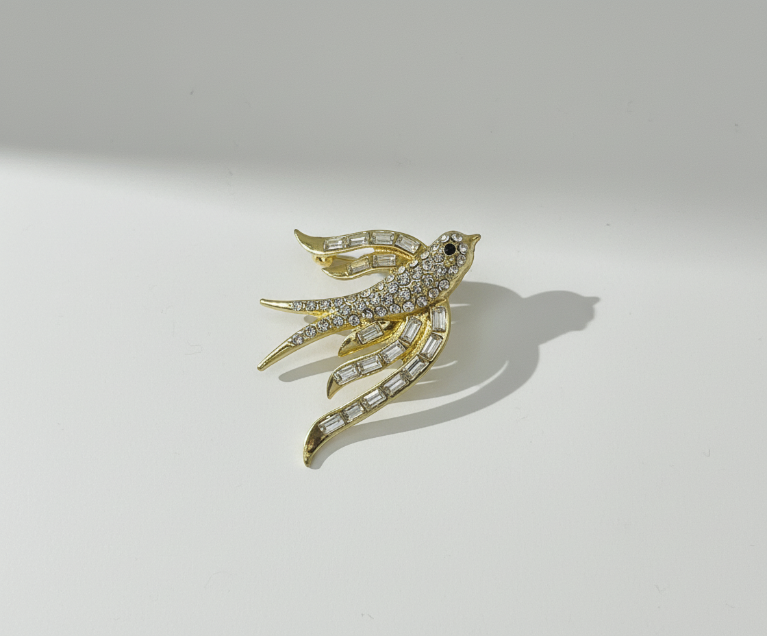 Broche Zwaluw shine