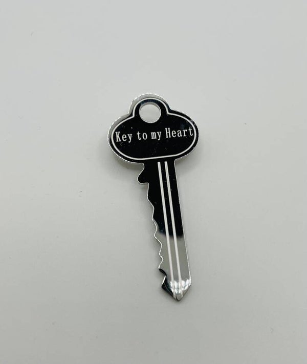 Broche ‘Key to my heart’ zilverkleur