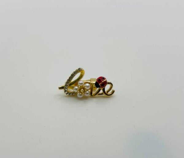 Broche Love